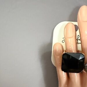 Elegant Black and Gold Ring